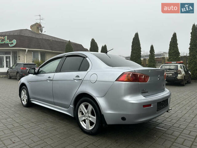 Серый Мицубиси Лансер, объемом двигателя 2 л и пробегом 279 тыс. км за 4999 $, фото 4 на Automoto.ua