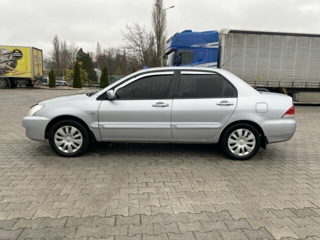 Сірий Міцубісі Lancer, об'ємом двигуна 1.6 л та пробігом 240 тис. км за 4650 $, фото 3 на Automoto.ua