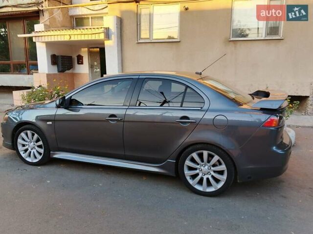 Серый Мицубиси Лансер, объемом двигателя 2.36 л и пробегом 225 тыс. км за 8500 $, фото 1 на Automoto.ua