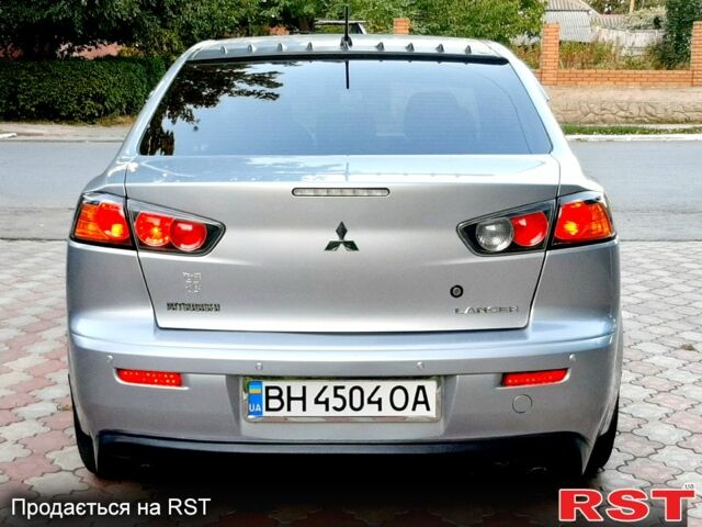 Сірий Міцубісі Lancer, об'ємом двигуна 1.5 л та пробігом 180 тис. км за 7750 $, фото 6 на Automoto.ua