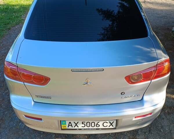 Сірий Міцубісі Lancer, об'ємом двигуна 1.5 л та пробігом 172 тис. км за 6300 $, фото 38 на Automoto.ua