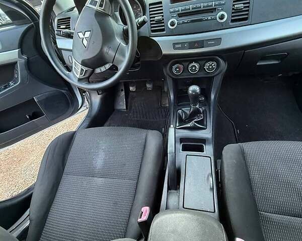 Серый Мицубиси Лансер, объемом двигателя 2 л и пробегом 272 тыс. км за 4499 $, фото 7 на Automoto.ua