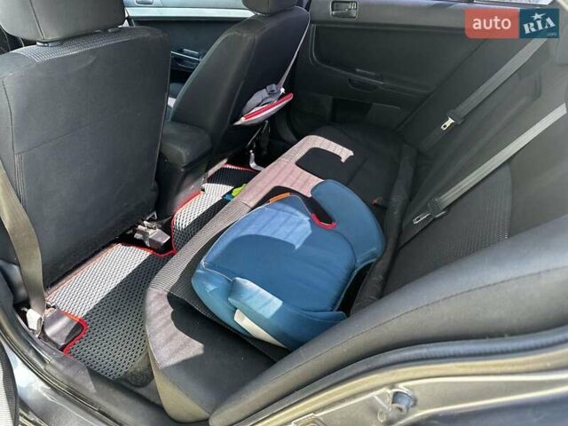 Сірий Міцубісі Lancer, об'ємом двигуна 1.5 л та пробігом 250 тис. км за 5500 $, фото 3 на Automoto.ua