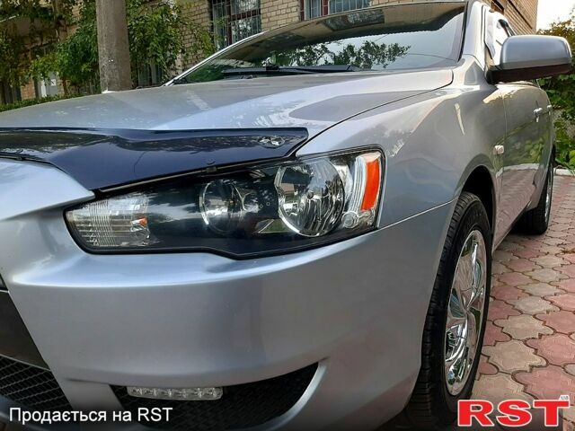 Сірий Міцубісі Lancer, об'ємом двигуна 1.5 л та пробігом 180 тис. км за 7750 $, фото 1 на Automoto.ua