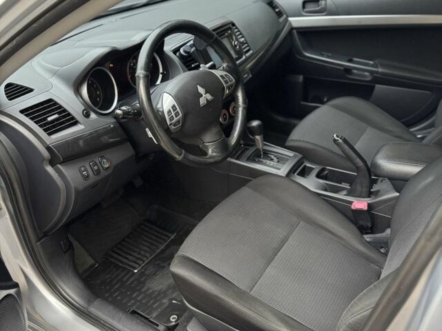 Серый Мицубиси Лансер, объемом двигателя 2 л и пробегом 220 тыс. км за 7450 $, фото 12 на Automoto.ua