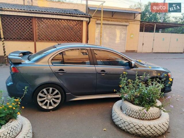 Серый Мицубиси Лансер, объемом двигателя 2.36 л и пробегом 225 тыс. км за 8500 $, фото 5 на Automoto.ua