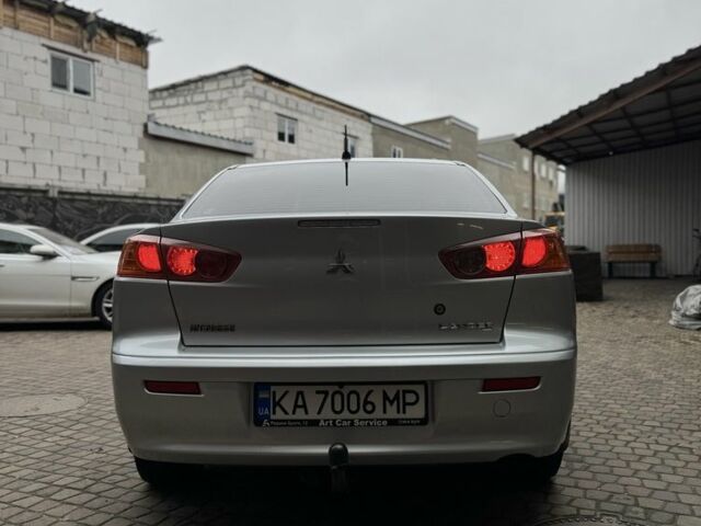 Серый Мицубиси Лансер, объемом двигателя 2 л и пробегом 220 тыс. км за 7450 $, фото 3 на Automoto.ua
