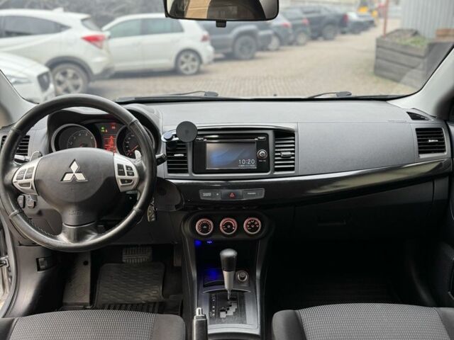 Серый Мицубиси Лансер, объемом двигателя 2 л и пробегом 220 тыс. км за 7450 $, фото 14 на Automoto.ua