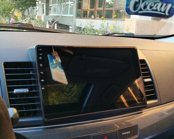 Серый Мицубиси Лансер, объемом двигателя 2.36 л и пробегом 225 тыс. км за 8500 $, фото 6 на Automoto.ua