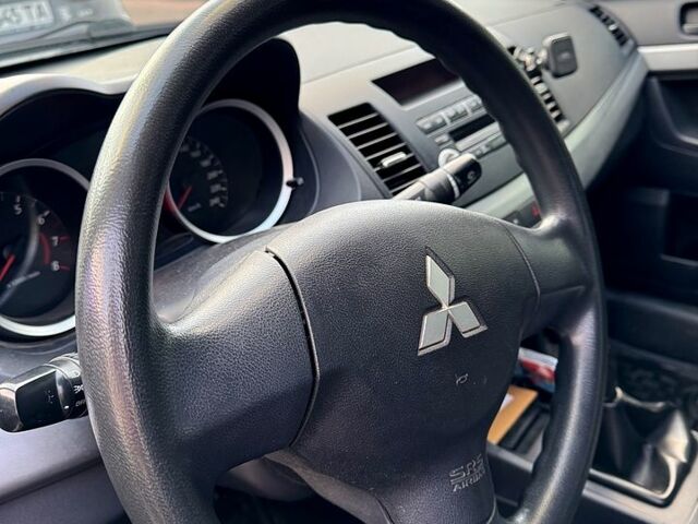 Сірий Міцубісі Lancer, об'ємом двигуна 1.5 л та пробігом 220 тис. км за 7200 $, фото 11 на Automoto.ua