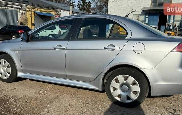 Серый Мицубиси Лансер, объемом двигателя 2 л и пробегом 272 тыс. км за 4499 $, фото 3 на Automoto.ua