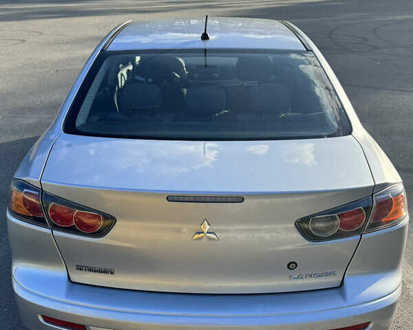 Серый Мицубиси Лансер, объемом двигателя 1.5 л и пробегом 89 тыс. км за 7600 $, фото 11 на Automoto.ua