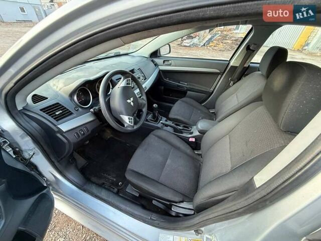 Серый Мицубиси Лансер, объемом двигателя 2 л и пробегом 272 тыс. км за 4499 $, фото 6 на Automoto.ua