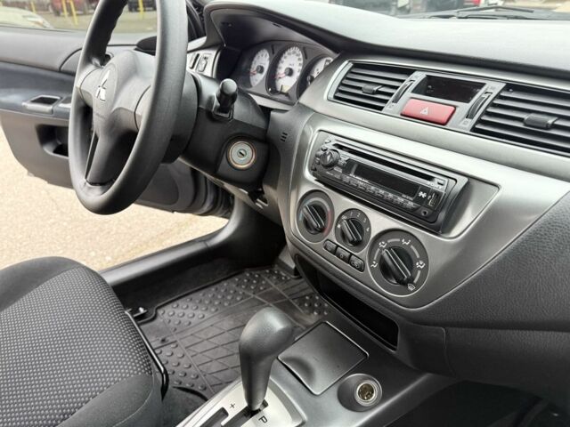 Сірий Міцубісі Lancer, об'ємом двигуна 1.6 л та пробігом 62 тис. км за 7300 $, фото 8 на Automoto.ua