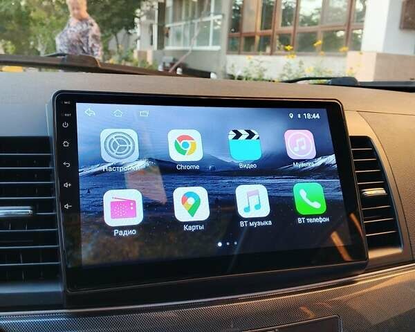 Серый Мицубиси Лансер, объемом двигателя 2.36 л и пробегом 225 тыс. км за 8500 $, фото 3 на Automoto.ua