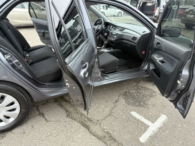 Сірий Міцубісі Lancer, об'ємом двигуна 1.6 л та пробігом 62 тис. км за 7300 $, фото 10 на Automoto.ua