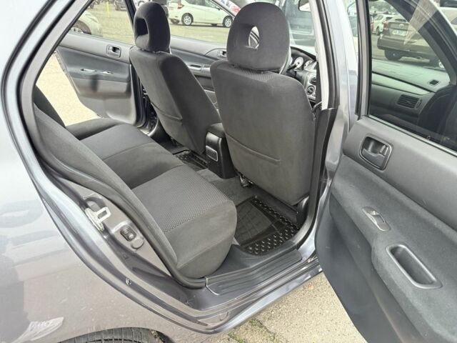 Сірий Міцубісі Lancer, об'ємом двигуна 1.6 л та пробігом 62 тис. км за 7300 $, фото 17 на Automoto.ua