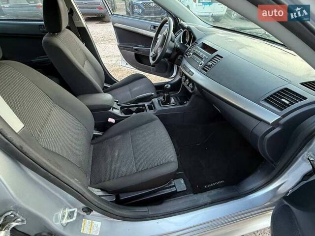 Серый Мицубиси Лансер, объемом двигателя 2 л и пробегом 272 тыс. км за 4499 $, фото 8 на Automoto.ua