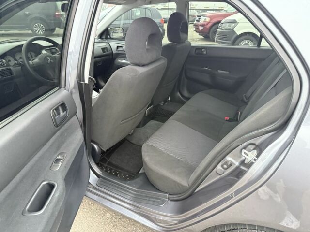 Сірий Міцубісі Lancer, об'ємом двигуна 1.6 л та пробігом 62 тис. км за 7300 $, фото 22 на Automoto.ua