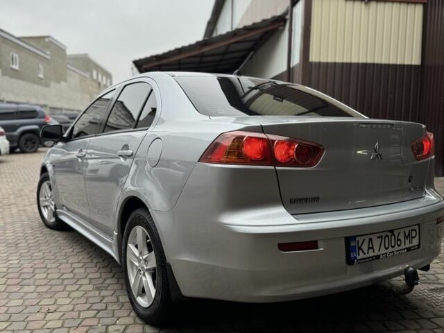 Серый Мицубиси Лансер, объемом двигателя 2 л и пробегом 220 тыс. км за 7450 $, фото 4 на Automoto.ua