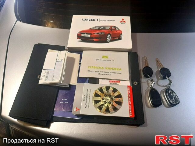 Сірий Міцубісі Lancer, об'ємом двигуна 1.5 л та пробігом 180 тис. км за 7750 $, фото 9 на Automoto.ua