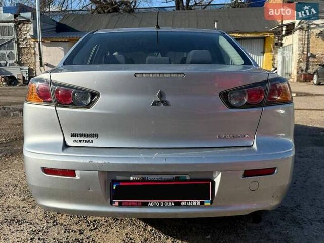 Серый Мицубиси Лансер, объемом двигателя 2 л и пробегом 272 тыс. км за 4499 $, фото 4 на Automoto.ua