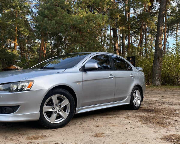 Серый Мицубиси Лансер, объемом двигателя 2 л и пробегом 239 тыс. км за 6999 $, фото 8 на Automoto.ua