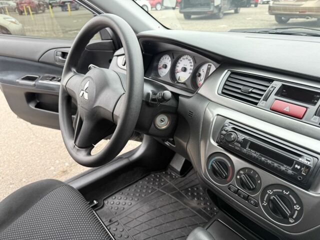 Сірий Міцубісі Lancer, об'ємом двигуна 1.6 л та пробігом 62 тис. км за 7300 $, фото 19 на Automoto.ua