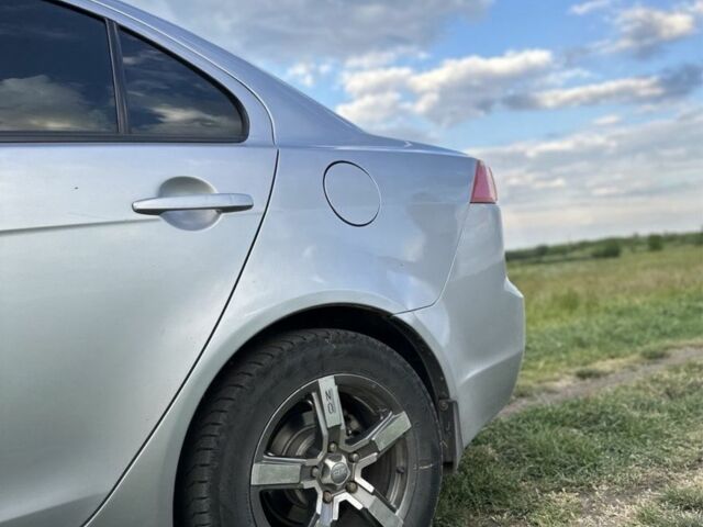 Сірий Міцубісі Lancer, об'ємом двигуна 1.5 л та пробігом 190 тис. км за 6800 $, фото 3 на Automoto.ua