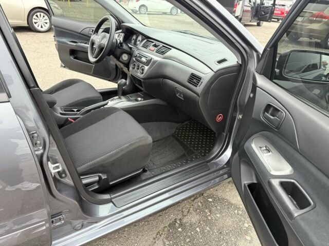 Сірий Міцубісі Lancer, об'ємом двигуна 1.6 л та пробігом 62 тис. км за 7300 $, фото 20 на Automoto.ua