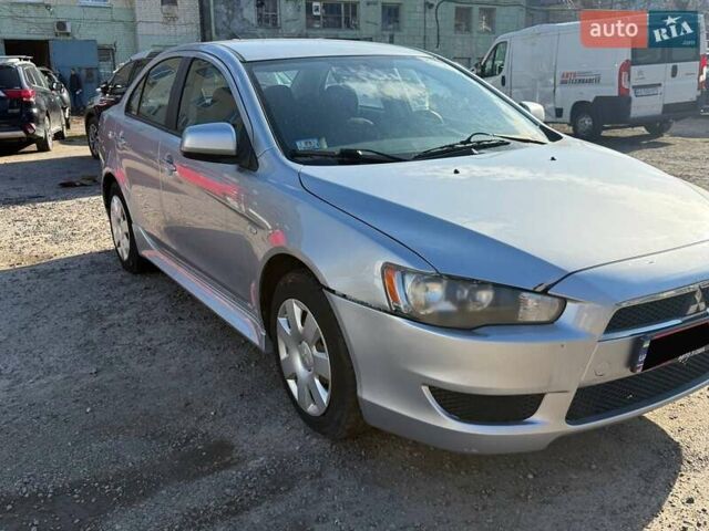 Серый Мицубиси Лансер, объемом двигателя 2 л и пробегом 272 тыс. км за 4499 $, фото 2 на Automoto.ua