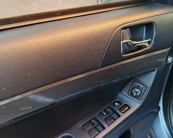 Серый Мицубиси Лансер, объемом двигателя 2.36 л и пробегом 225 тыс. км за 8500 $, фото 13 на Automoto.ua