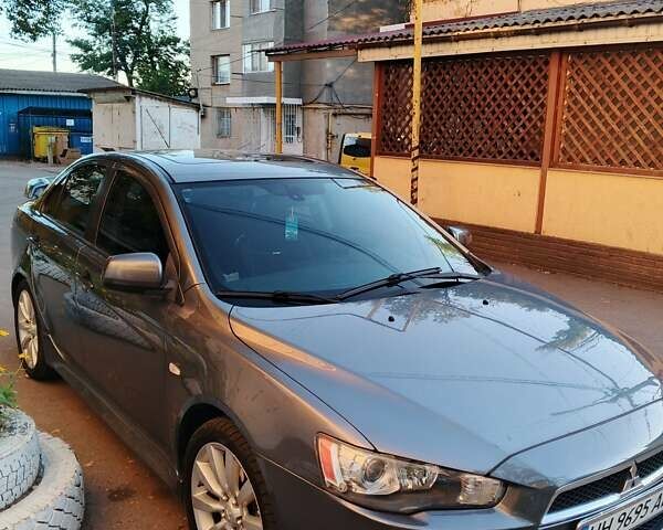 Серый Мицубиси Лансер, объемом двигателя 2.36 л и пробегом 225 тыс. км за 8500 $, фото 9 на Automoto.ua