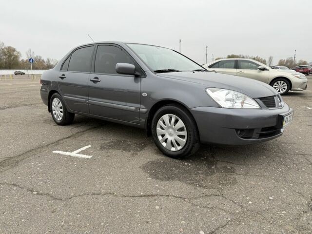 Сірий Міцубісі Lancer, об'ємом двигуна 1.6 л та пробігом 62 тис. км за 7300 $, фото 1 на Automoto.ua