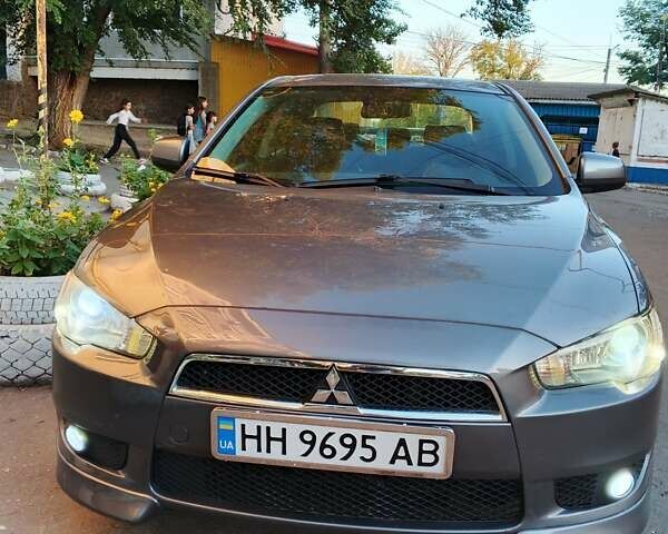 Серый Мицубиси Лансер, объемом двигателя 2.36 л и пробегом 225 тыс. км за 8500 $, фото 8 на Automoto.ua