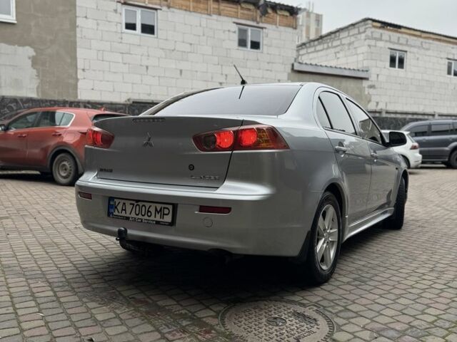 Серый Мицубиси Лансер, объемом двигателя 2 л и пробегом 220 тыс. км за 7450 $, фото 2 на Automoto.ua