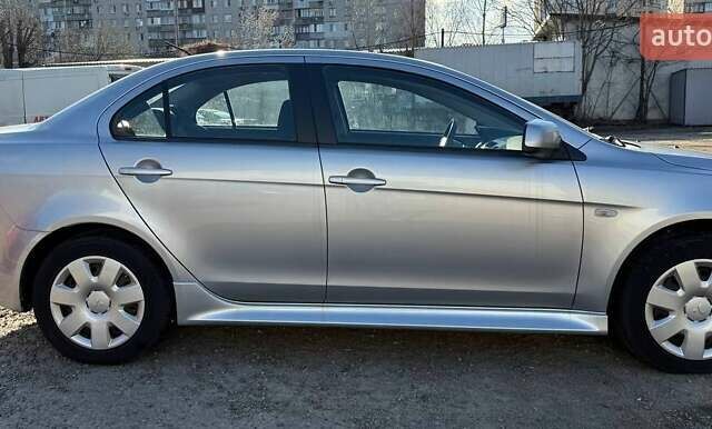 Серый Мицубиси Лансер, объемом двигателя 2 л и пробегом 272 тыс. км за 4499 $, фото 5 на Automoto.ua