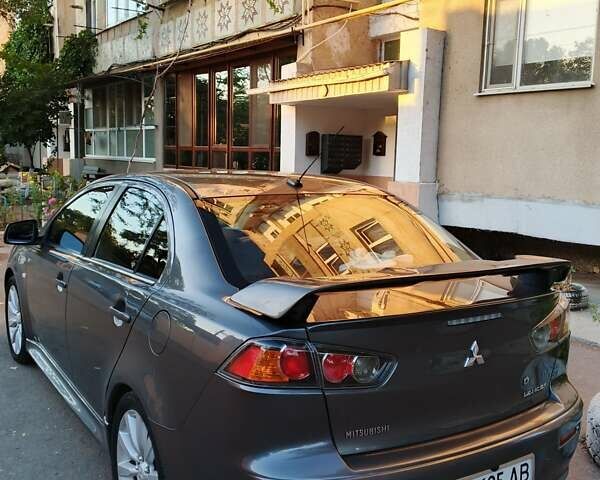 Серый Мицубиси Лансер, объемом двигателя 2.36 л и пробегом 225 тыс. км за 8500 $, фото 7 на Automoto.ua