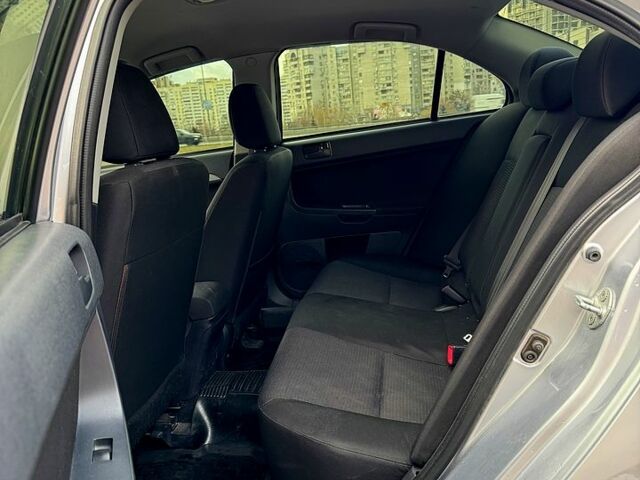 Сірий Міцубісі Lancer, об'ємом двигуна 1.5 л та пробігом 220 тис. км за 7200 $, фото 10 на Automoto.ua