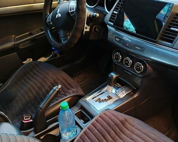 Серый Мицубиси Лансер, объемом двигателя 2.36 л и пробегом 225 тыс. км за 8500 $, фото 11 на Automoto.ua