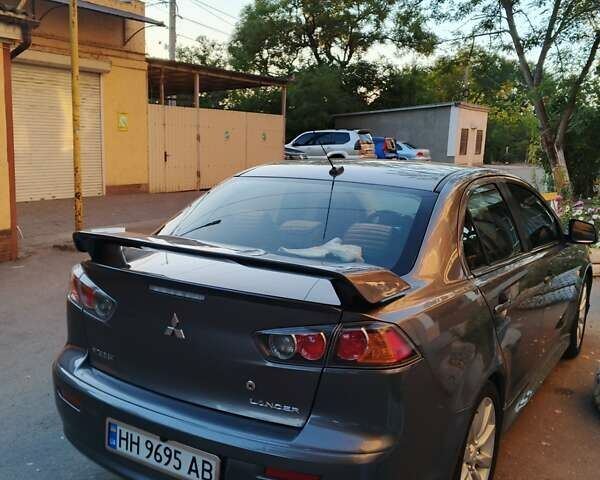 Серый Мицубиси Лансер, объемом двигателя 2.36 л и пробегом 225 тыс. км за 8500 $, фото 2 на Automoto.ua