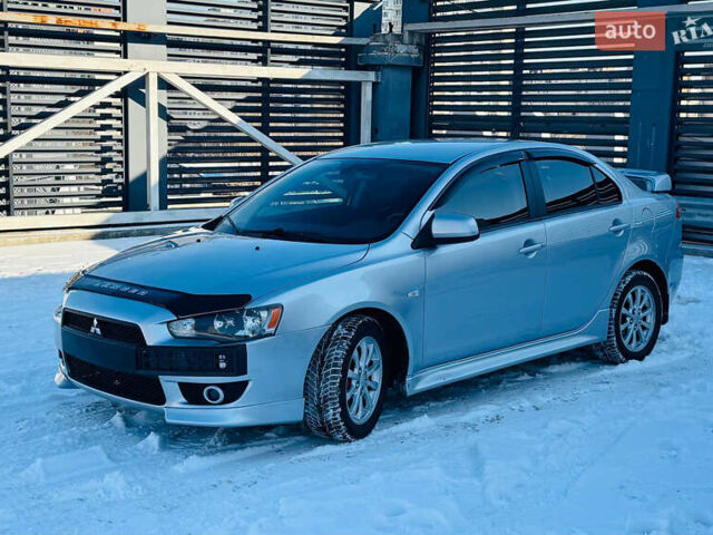 Серый Мицубиси Лансер, объемом двигателя 2 л и пробегом 174 тыс. км за 7200 $, фото 8 на Automoto.ua