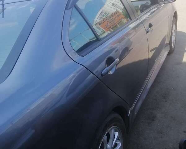 Сірий Міцубісі Lancer, об'ємом двигуна 2 л та пробігом 263 тис. км за 7000 $, фото 3 на Automoto.ua