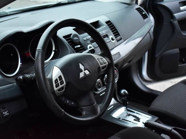 Сірий Міцубісі Lancer, об'ємом двигуна 2 л та пробігом 178 тис. км за 7400 $, фото 12 на Automoto.ua