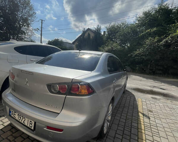 Мицубиси Лансер 2011 в Львове на Automoto.ua Серый Мицубиси Лансер, объемом двигателя 2 л и пробегом 104 тыс. км за 10500 $, фото 14 на Automoto.ua