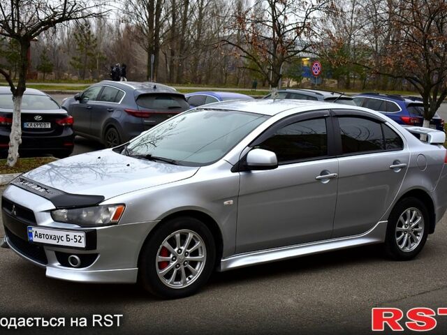 Серый Мицубиси Лансер, объемом двигателя 2 л и пробегом 178 тыс. км за 7400 $, фото 2 на Automoto.ua