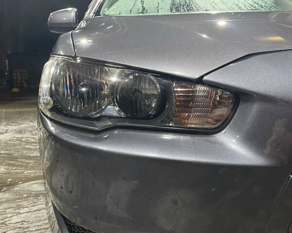 Серый Мицубиси Лансер, объемом двигателя 1.5 л и пробегом 227 тыс. км за 7300 $, фото 6 на Automoto.ua