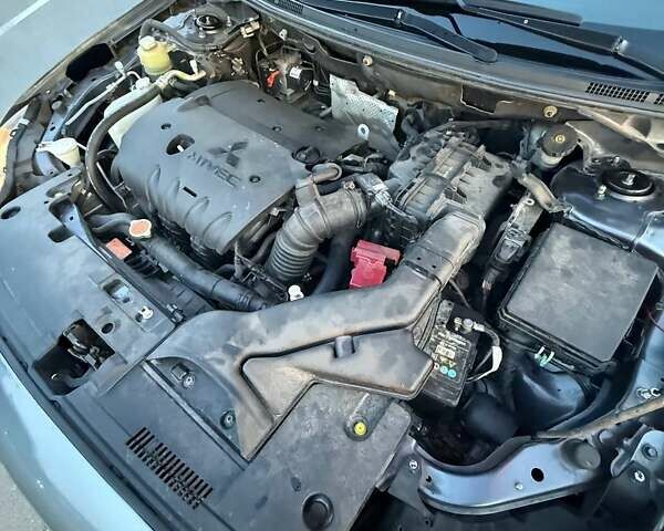 Серый Мицубиси Лансер, объемом двигателя 2 л и пробегом 191 тыс. км за 7900 $, фото 6 на Automoto.ua