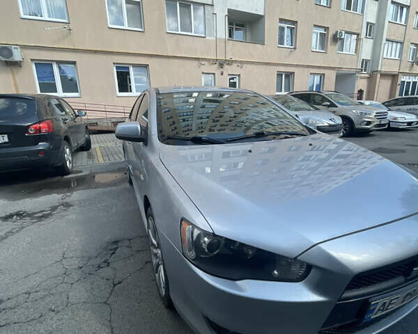 Мицубиси Лансер 2011 в Львове на Automoto.ua Серый Мицубиси Лансер, объемом двигателя 2 л и пробегом 104 тыс. км за 10500 $, фото 35 на Automoto.ua