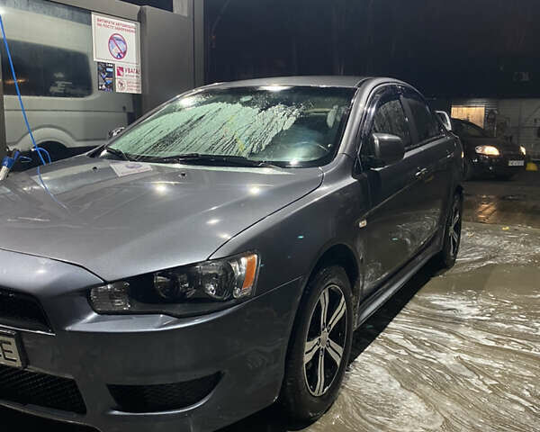 Серый Мицубиси Лансер, объемом двигателя 1.5 л и пробегом 227 тыс. км за 7300 $, фото 3 на Automoto.ua